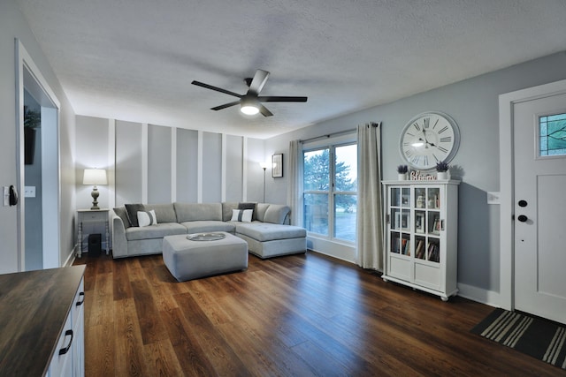 4634 State Route 61, Sunbury, OH 43074 - living area featuring dark wood finished floors, a ceiling fan, and a textured ceiling