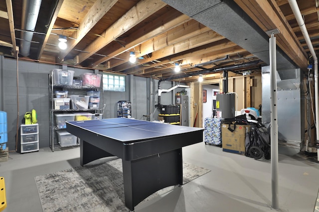 4634 State Route 61, Sunbury, OH 43074 - game room featuring water heater and finished concrete flooring