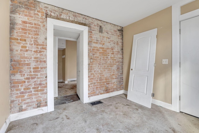 749-751 E Main St Unit 749, Columbus, OH 43205 - carpeted spare room with brick wall