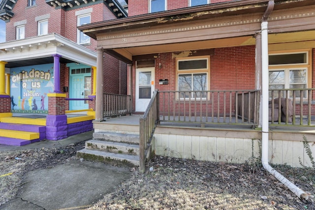 749-751 E Main St Unit 749, Columbus, OH 43205 - property entrance featuring a porch and brick siding