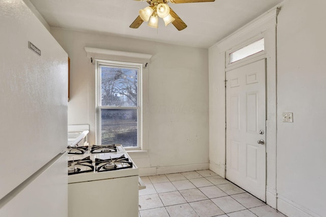 749-751 E Main St Unit 749, Columbus, OH 43205 - kitchen with freestanding refrigerator, stove, a ceiling fan, and light tile patterned flooring