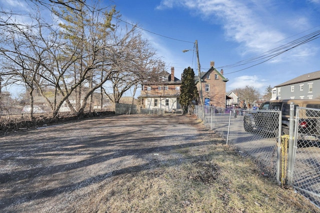 749-751 E Main St Unit 749, Columbus, OH 43205 - view of dirt / gravel road featuring a gated entry