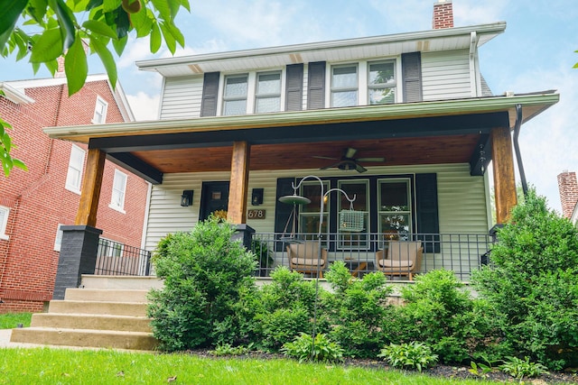 678 S Cassingham Rd, Columbus, OH 43209 - view of front of home with a porch, a ceiling fan, and a chimney