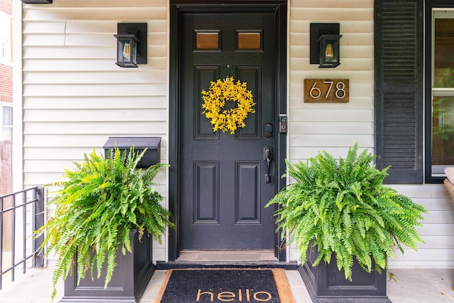 678 S Cassingham Rd, Columbus, OH 43209 - property entrance featuring a porch and uncovered parking
