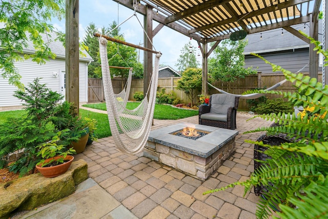 678 S Cassingham Rd, Columbus, OH 43209 - fenced backyard featuring an outdoor fire pit, a patio area, and a pergola