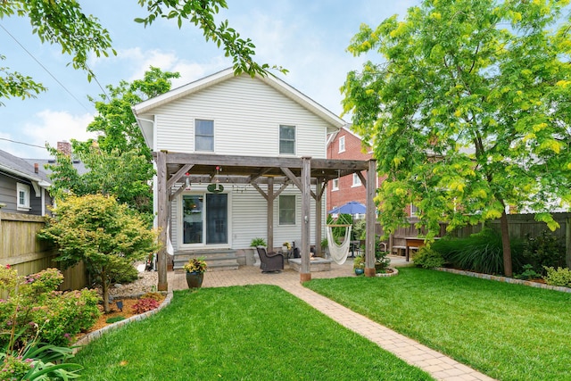 678 S Cassingham Rd, Columbus, OH 43209 - back of house with a fenced backyard, entry steps, and a patio