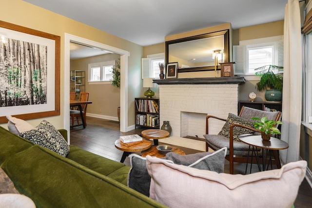 678 S Cassingham Rd, Columbus, OH 43209 - living area with wood-type flooring and a brick fireplace