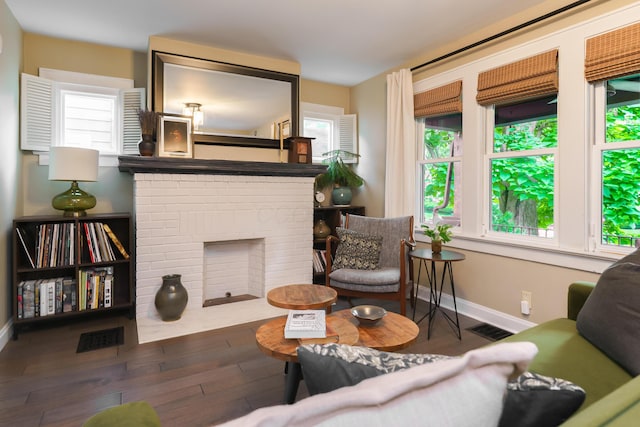 678 S Cassingham Rd, Columbus, OH 43209 - living room with wood finished floors and a fireplace