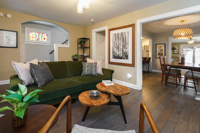 678 S Cassingham Rd, Columbus, OH 43209 - living room featuring baseboards and dark wood-style flooring