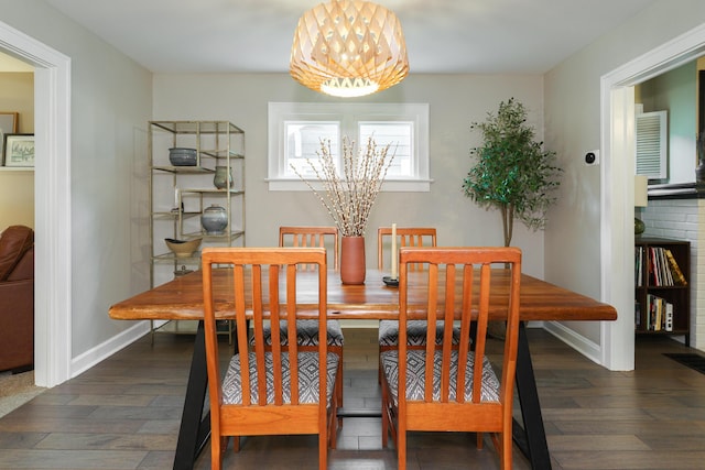 678 S Cassingham Rd, Columbus, OH 43209 - dining space with a chandelier and dark wood finished floors