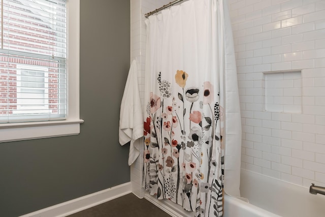 678 S Cassingham Rd, Columbus, OH 43209 - bathroom with shower / tub combo with curtain and baseboards