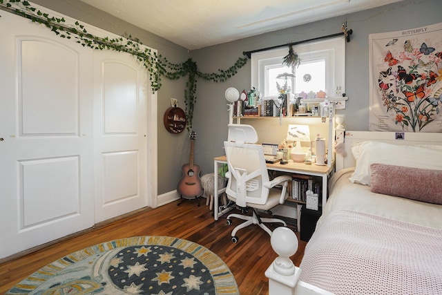 678 S Cassingham Rd, Columbus, OH 43209 - bedroom featuring wood finished floors and a closet