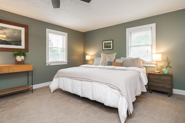678 S Cassingham Rd, Columbus, OH 43209 - bedroom featuring light carpet and a ceiling fan
