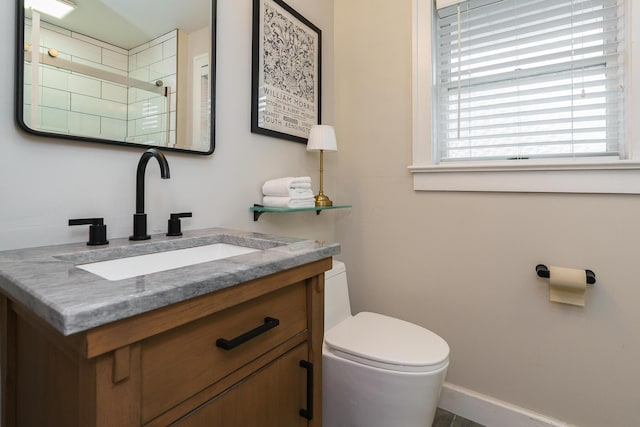 678 S Cassingham Rd, Columbus, OH 43209 - bathroom with vanity and a tile shower