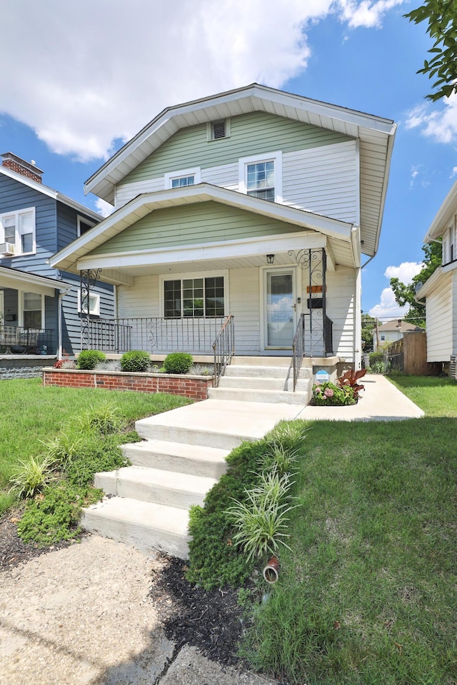 274 E Jenkins Ave, Columbus, OH 43207 - view of front of property with a front yard and covered porch