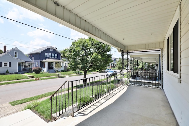 274 E Jenkins Ave, Columbus, OH 43207 - porch featuring a residential view and a yard