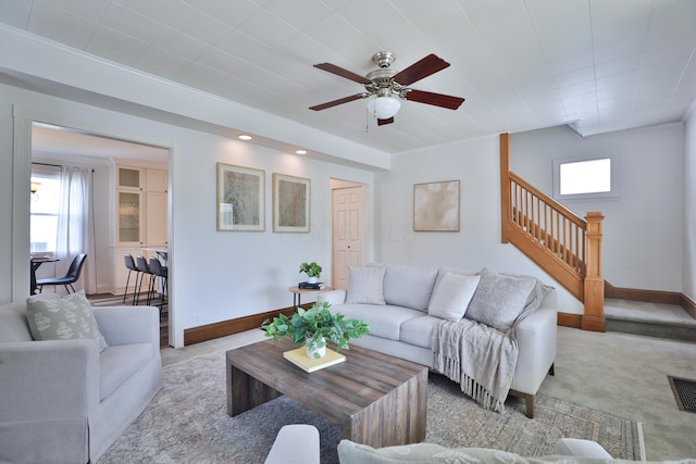 274 E Jenkins Ave, Columbus, OH 43207 - living room featuring stairs, ceiling fan, light colored carpet, and recessed lighting