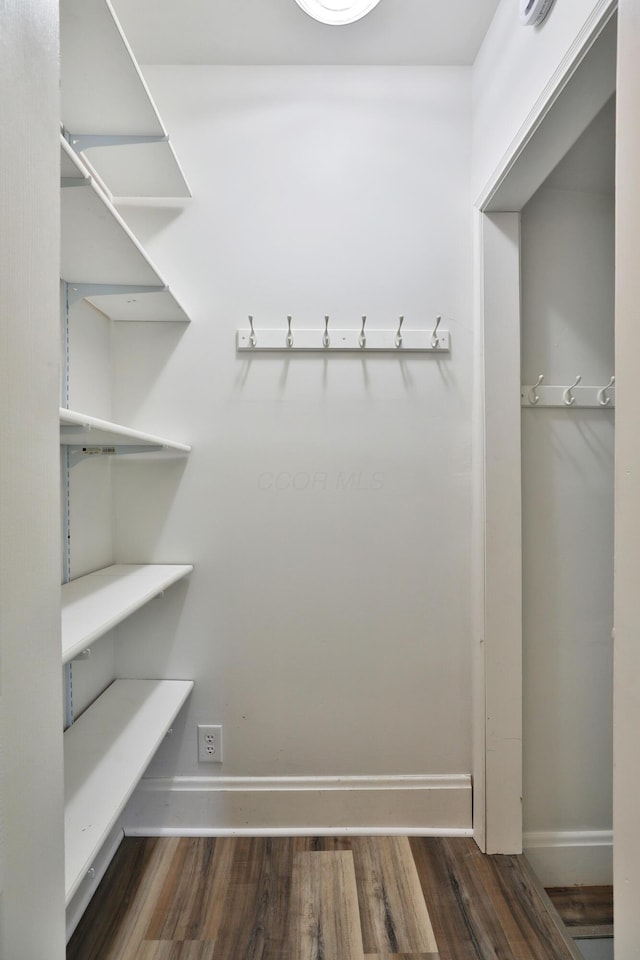 274 E Jenkins Ave, Columbus, OH 43207 - walk in closet featuring wood finished floors