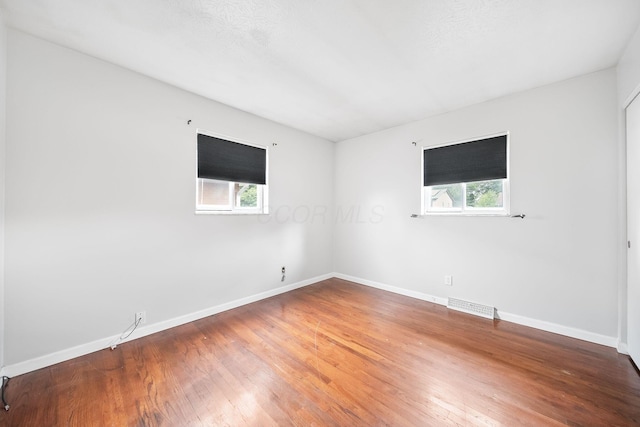 1799 Ormond Ave, Columbus, OH 43224 - unfurnished room with plenty of natural light and wood finished floors