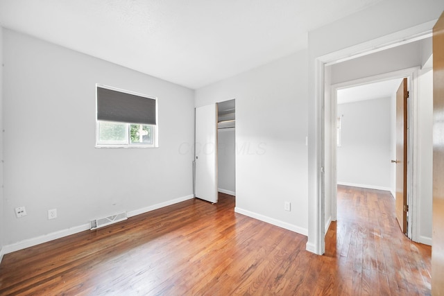 1799 Ormond Ave, Columbus, OH 43224 - unfurnished bedroom featuring wood finished floors and a closet