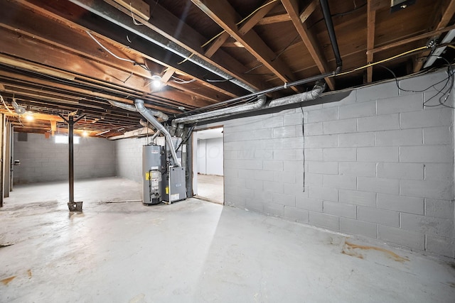 1799 Ormond Ave, Columbus, OH 43224 - unfinished below grade area with water heater and heating unit