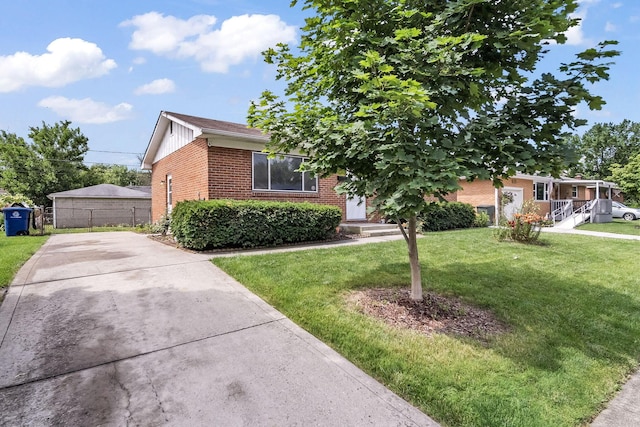 1799 Ormond Ave, Columbus, OH 43224 - view of front facade with brick siding and board and batten siding