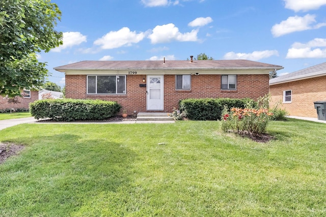 1799 Ormond Ave, Columbus, OH 43224 - view of front of property featuring a front yard and brick siding