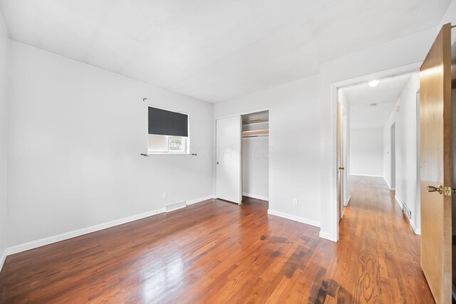 1799 Ormond Ave, Columbus, OH 43224 - unfurnished bedroom featuring wood finished floors and a closet