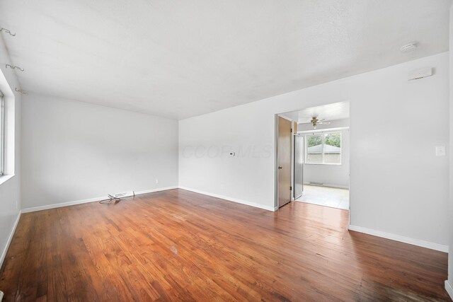 1799 Ormond Ave, Columbus, OH 43224 - spare room with wood finished floors, a ceiling fan, and a smoke detector