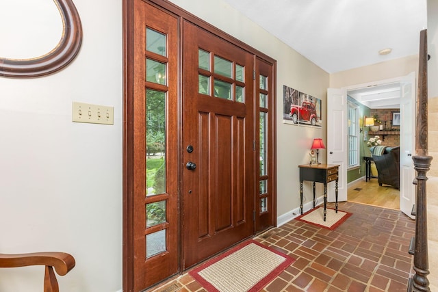 2211 Welsh Hills Rd NE, Granville, OH 43023 - entrance foyer with brick floors and plenty of natural light