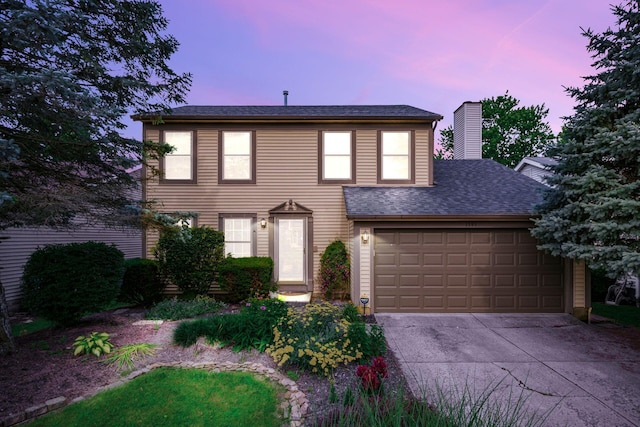 1191 Wexford Green Blvd, Columbus, OH 43228 - colonial home with concrete driveway, a garage, and roof with shingles
