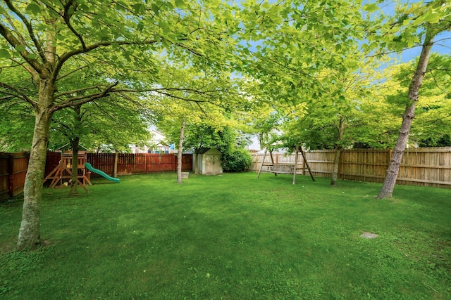 1191 Wexford Green Blvd, Columbus, OH 43228 - fenced backyard featuring a playground and a shed