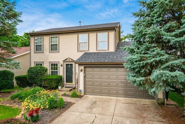 1191 Wexford Green Blvd, Columbus, OH 43228 - view of front of home with concrete driveway and roof with shingles