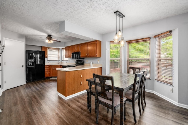 1191 Wexford Green Blvd, Columbus, OH 43228 - dining area featuring a textured ceiling, dark wood-style flooring, ceiling fan, and plenty of natural light
