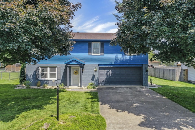 1588 Constitution Dr, Newark, OH 43055 - traditional-style house with an attached garage, concrete driveway, and brick siding