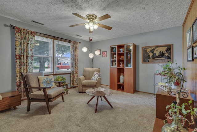 1588 Constitution Dr, Newark, OH 43055 - sitting room with carpet floors, a textured ceiling, and ceiling fan