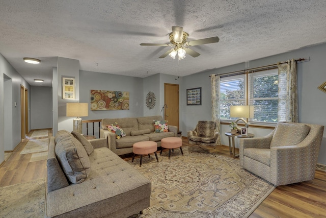 1588 Constitution Dr, Newark, OH 43055 - living room featuring a textured ceiling, wood finished floors, and ceiling fan