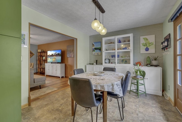 1588 Constitution Dr, Newark, OH 43055 - dining area featuring a textured ceiling