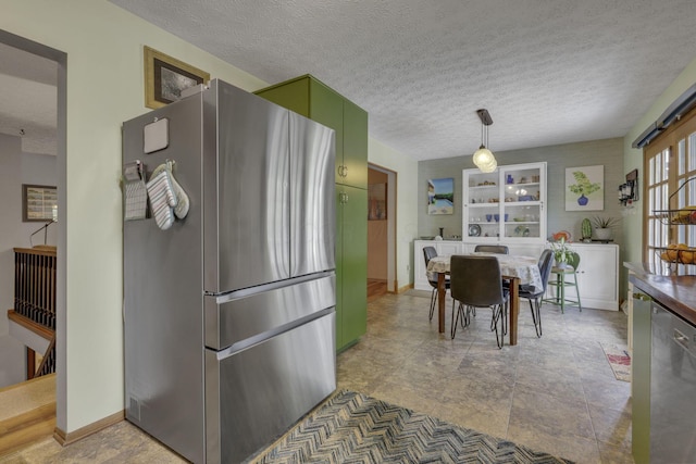 1588 Constitution Dr, Newark, OH 43055 - kitchen featuring stainless steel appliances, green cabinetry, and a textured ceiling