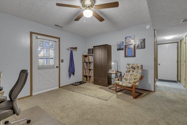 1588 Constitution Dr, Newark, OH 43055 - home office featuring a textured ceiling, light carpet, and a ceiling fan