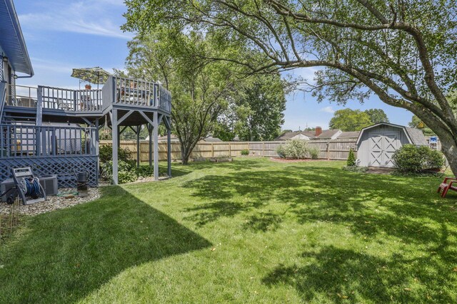 1588 Constitution Dr, Newark, OH 43055 - fenced backyard with a storage unit and a deck