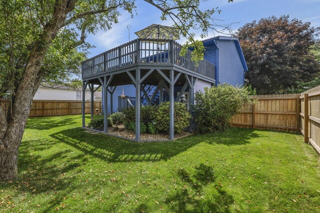 1588 Constitution Dr, Newark, OH 43055 - back of house with a deck and a fenced backyard
