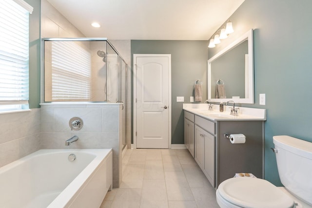 6452 Rockhold Dr, Westerville, OH 43081 - bathroom with a bath, vanity, a stall shower, and tile patterned flooring