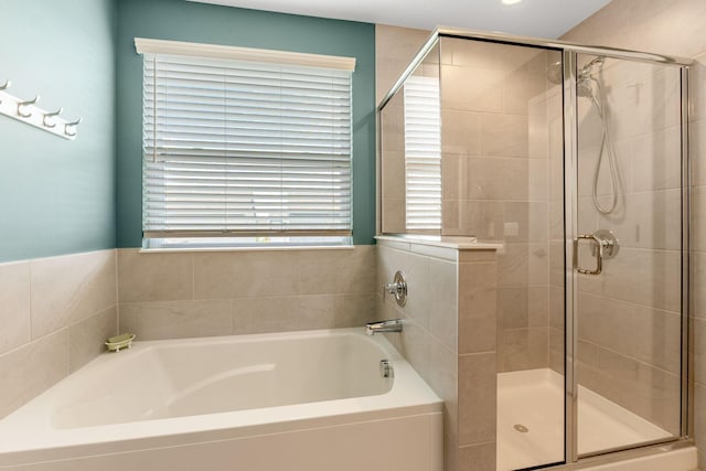6452 Rockhold Dr, Westerville, OH 43081 - bathroom with a bath and a shower stall