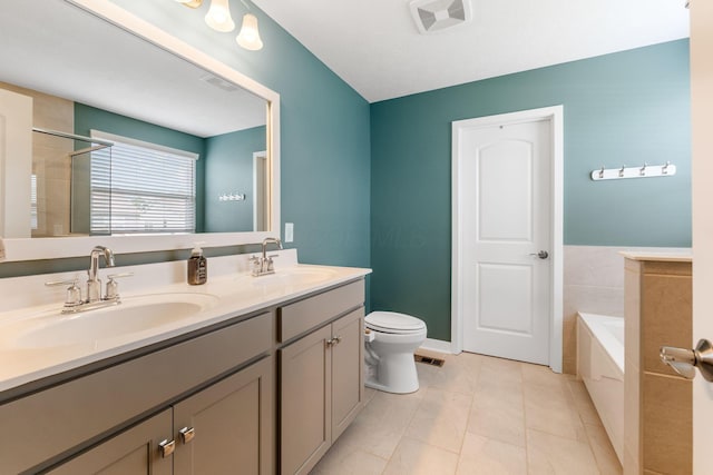6452 Rockhold Dr, Westerville, OH 43081 - full bath with a garden tub, double vanity, tile patterned floors, and a shower
