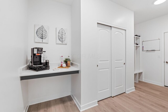 6452 Rockhold Dr, Westerville, OH 43081 - hall with light wood-style floors and baseboards