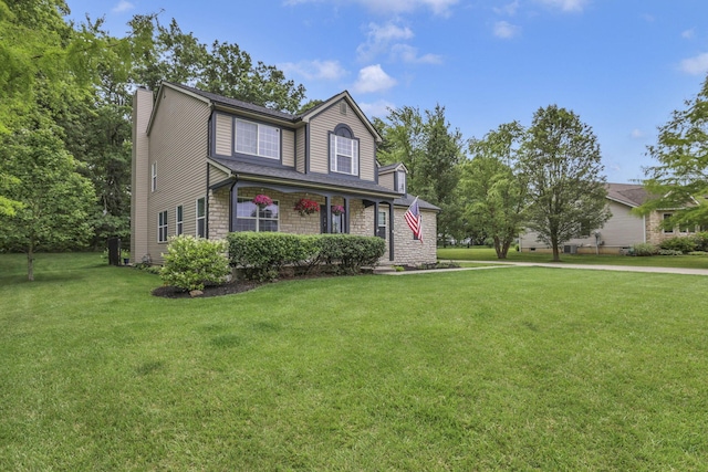 173 Zackary Dr, Granville, OH 43023 - traditional-style home with a chimney and a front lawn