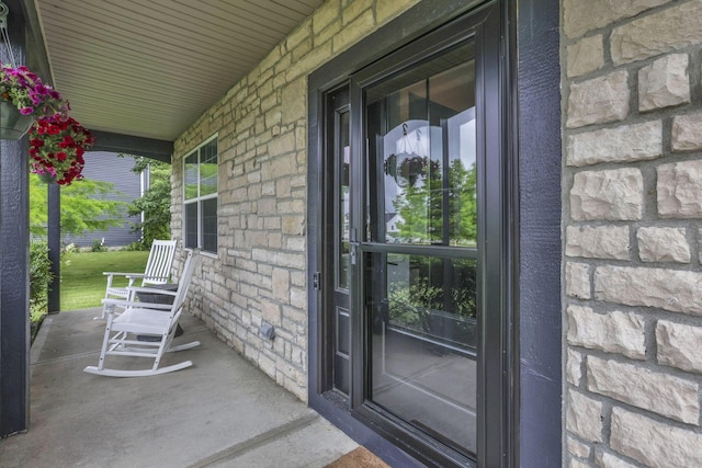 173 Zackary Dr, Granville, OH 43023 - view of exterior entry with covered porch and stone siding