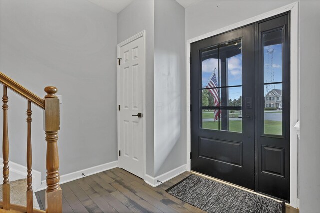 173 Zackary Dr, Granville, OH 43023 - foyer entrance featuring dark wood-style flooring and stairs