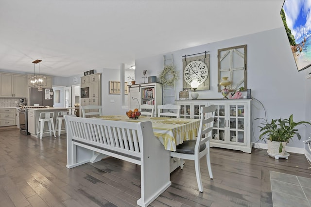 173 Zackary Dr, Granville, OH 43023 - dining room featuring dark wood-style floors and a chandelier